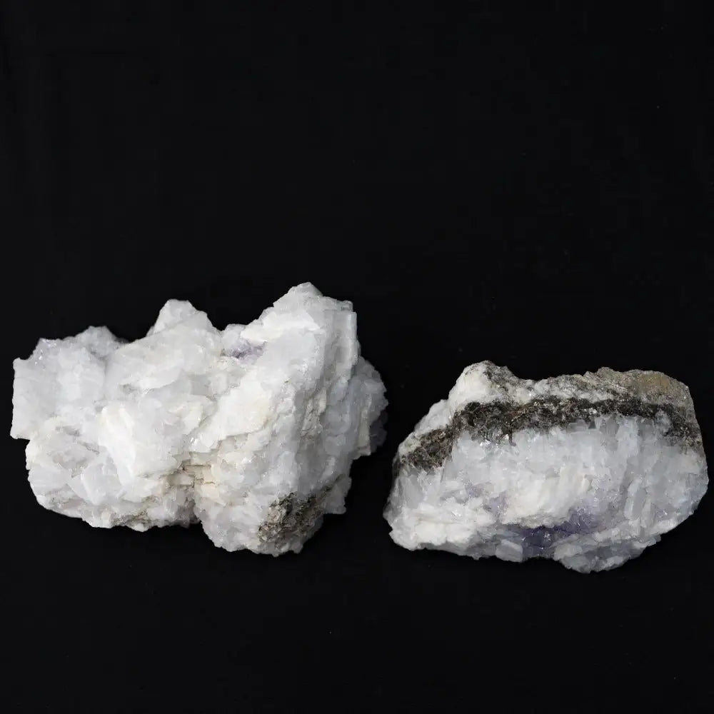 Fluorite On Selenite Mineral  one specimen all white and the other is white and purple