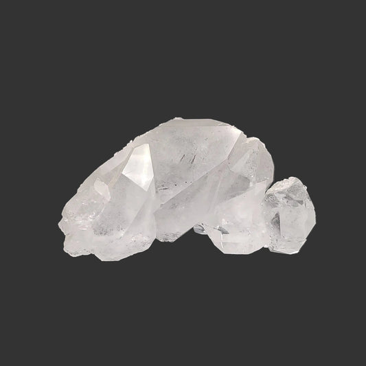 Front side of this double-terminated Quartz crystal cluster in front of a black background.