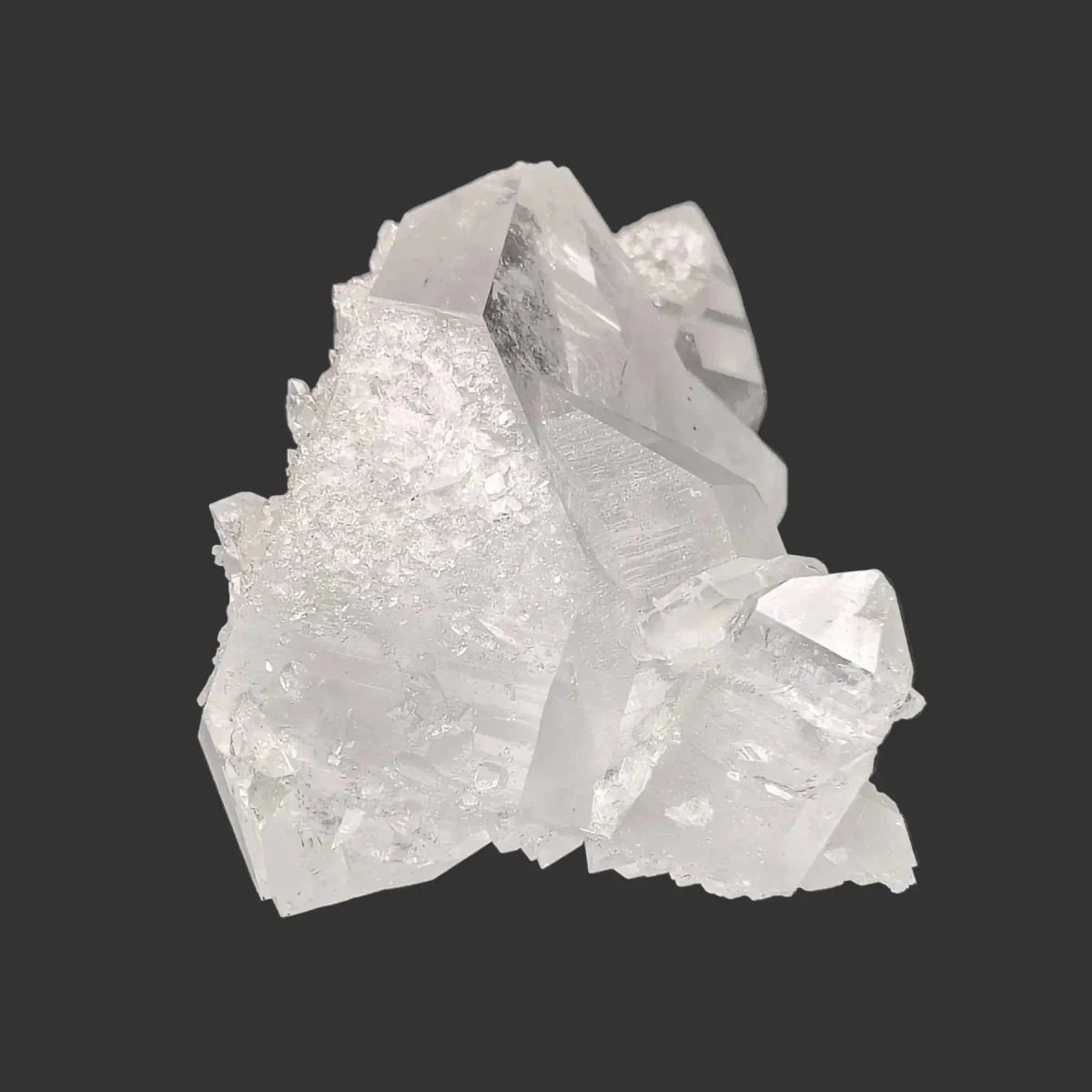 The right side of this double-terminated Quartz crystal cluster in front of a black background.