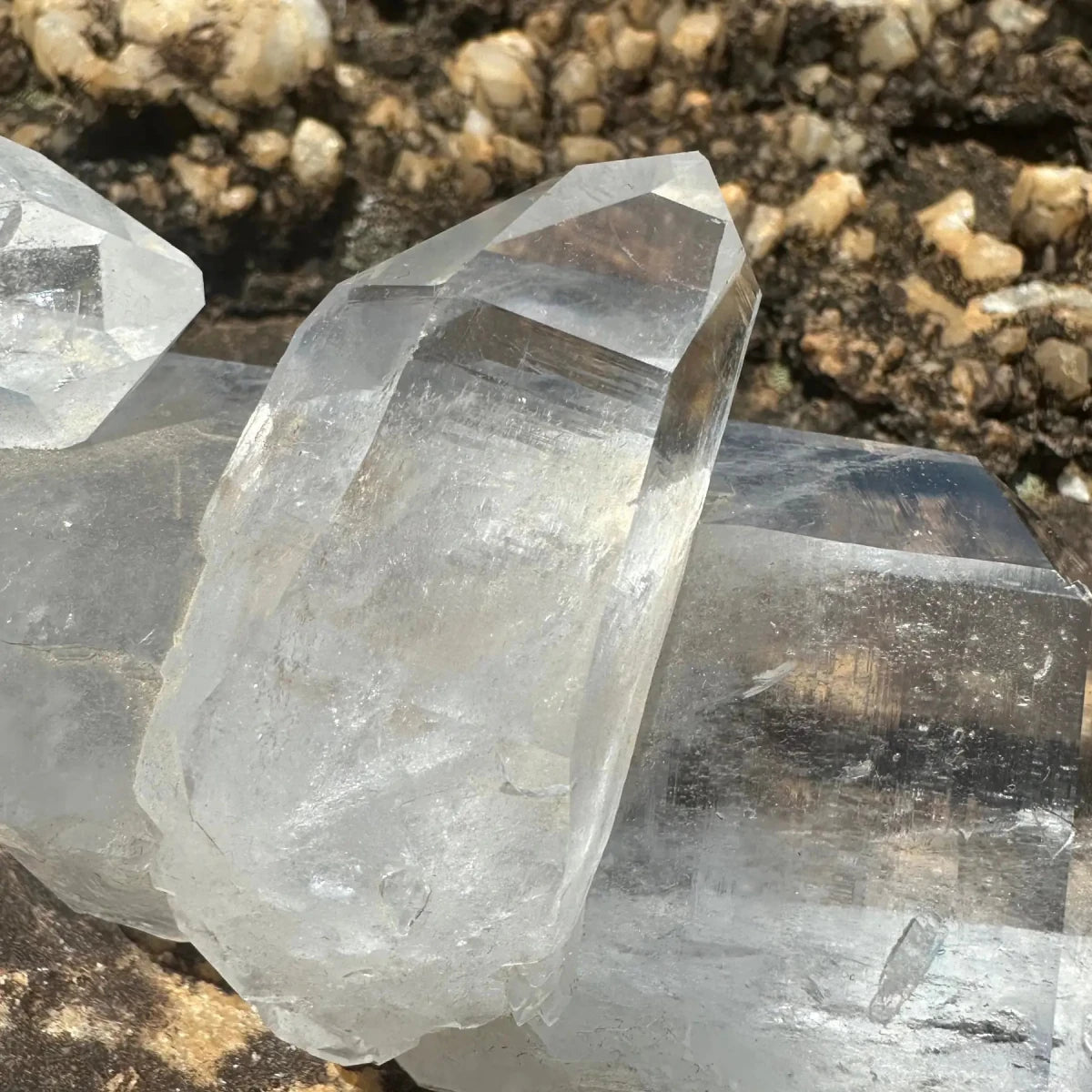 Close Up Of Crystal Point Attached To The Larger Point