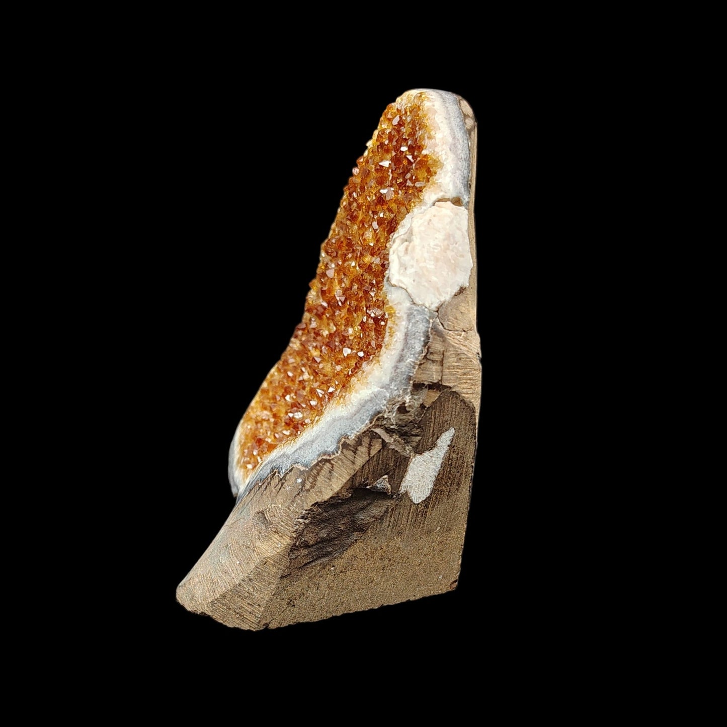 This is the left side of this Citrine geode cut base specimen