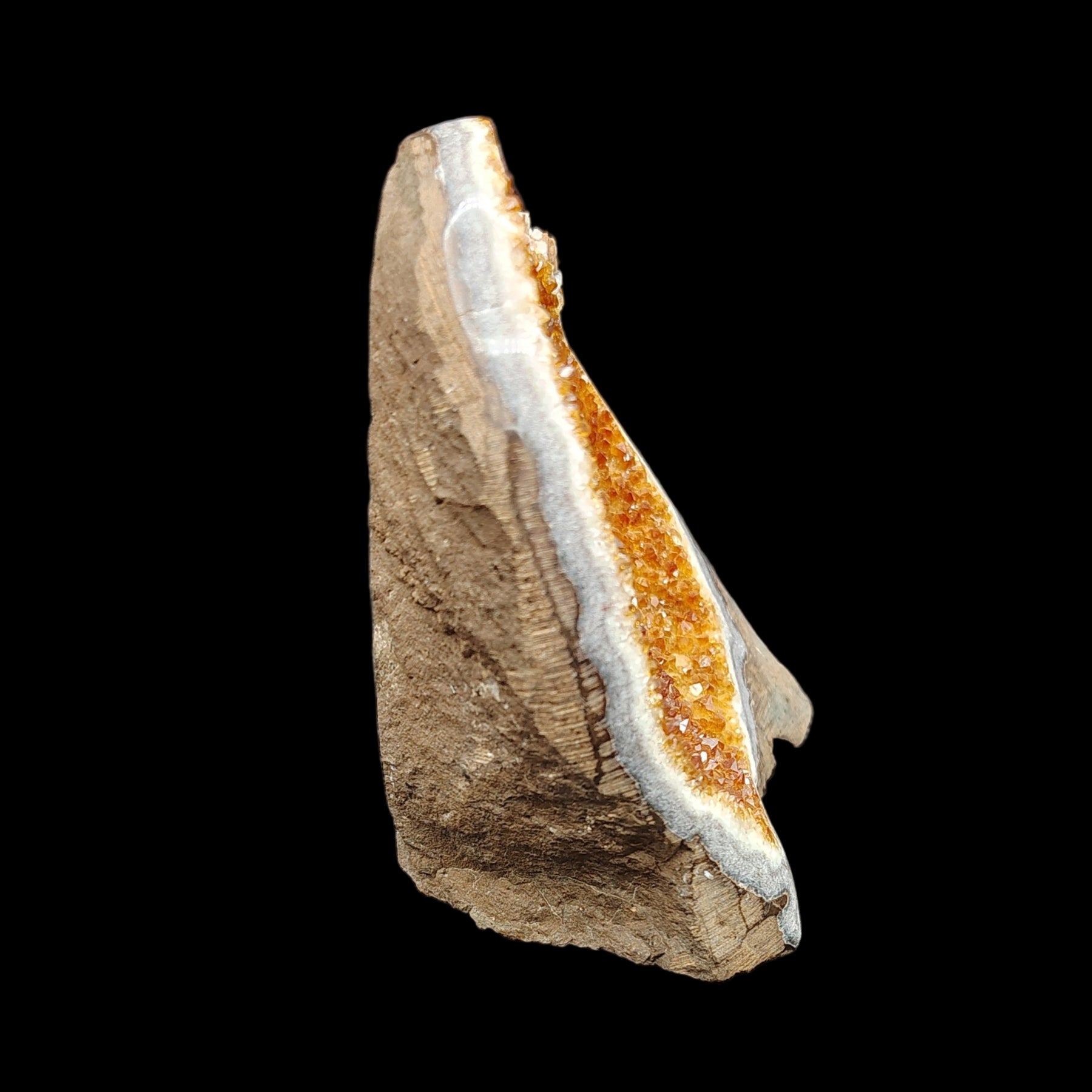 This is the right side of this Citrine geode cut base specimen