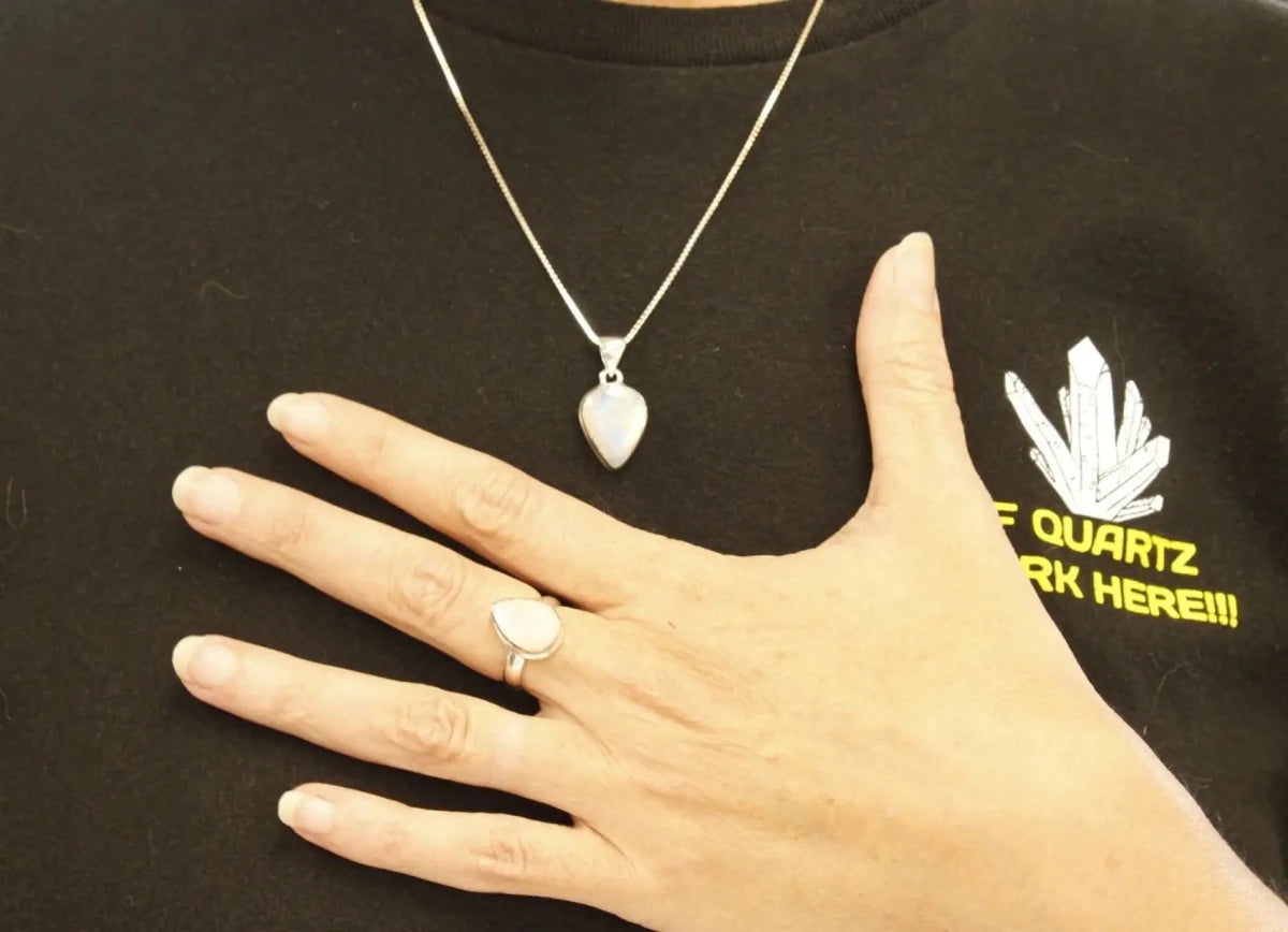 Woman wearing Rainbow Moonstone Necklace and Ring Set