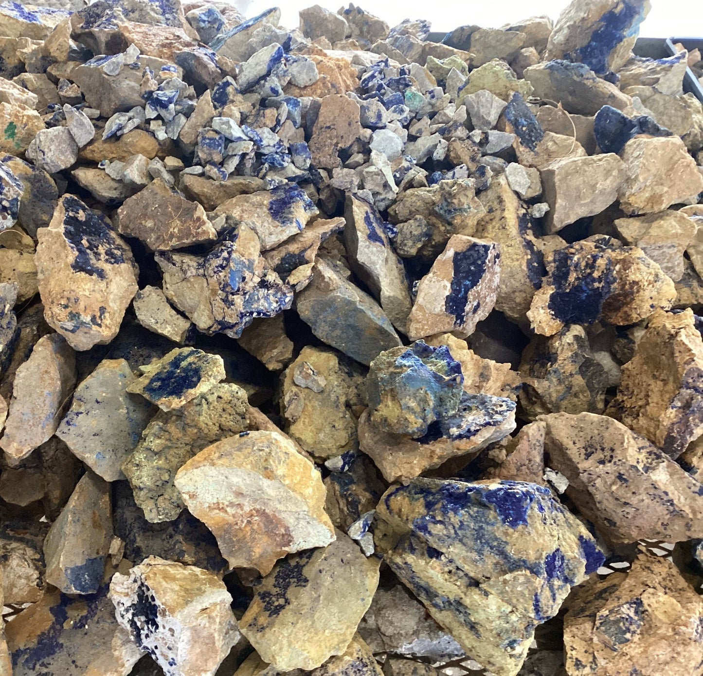 Close-up of a pile of rocks with blue and brown colors