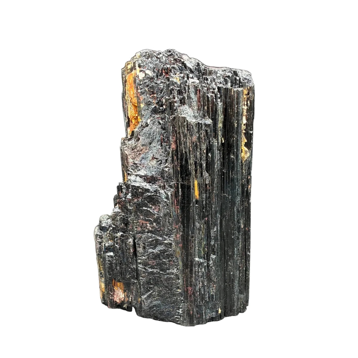 Back side of this black Tourmaline cut base specimen, in front of a white background.