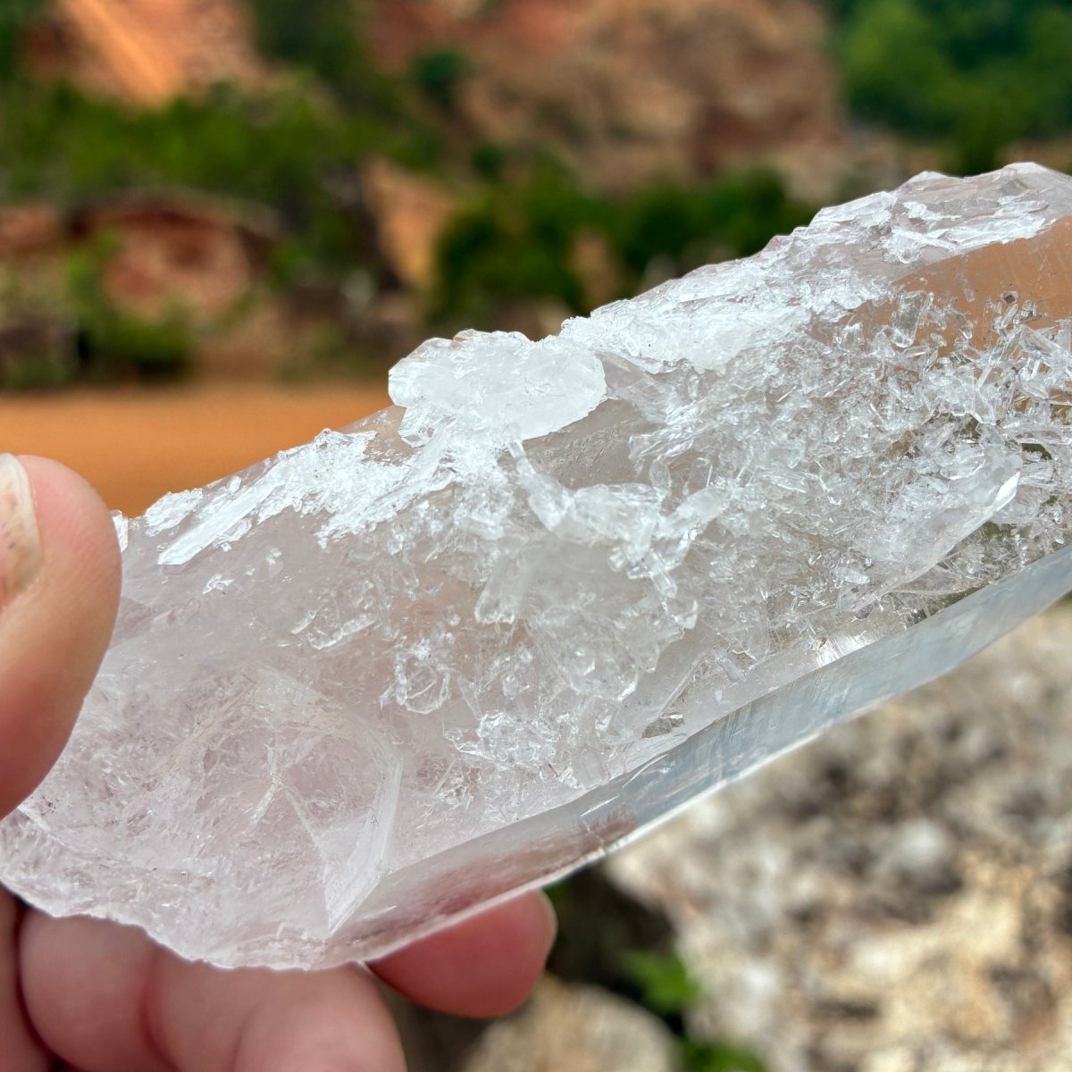 Close up of the tabby and fairy dust, on the front side of this Quartz crystal point.