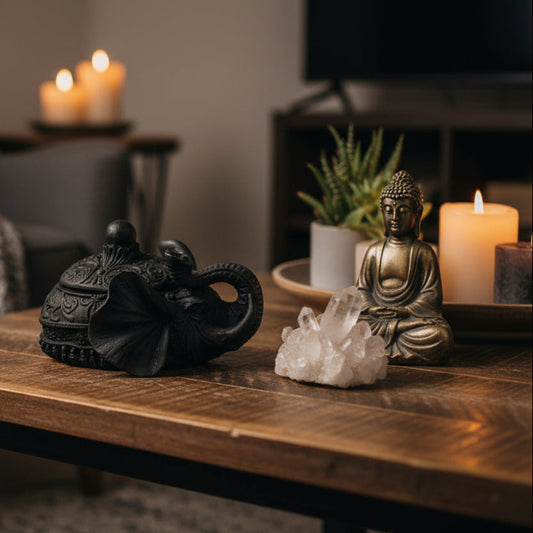 Side view of Shungite trinket bowl in a living area setting, on a coffee table next to other decor.