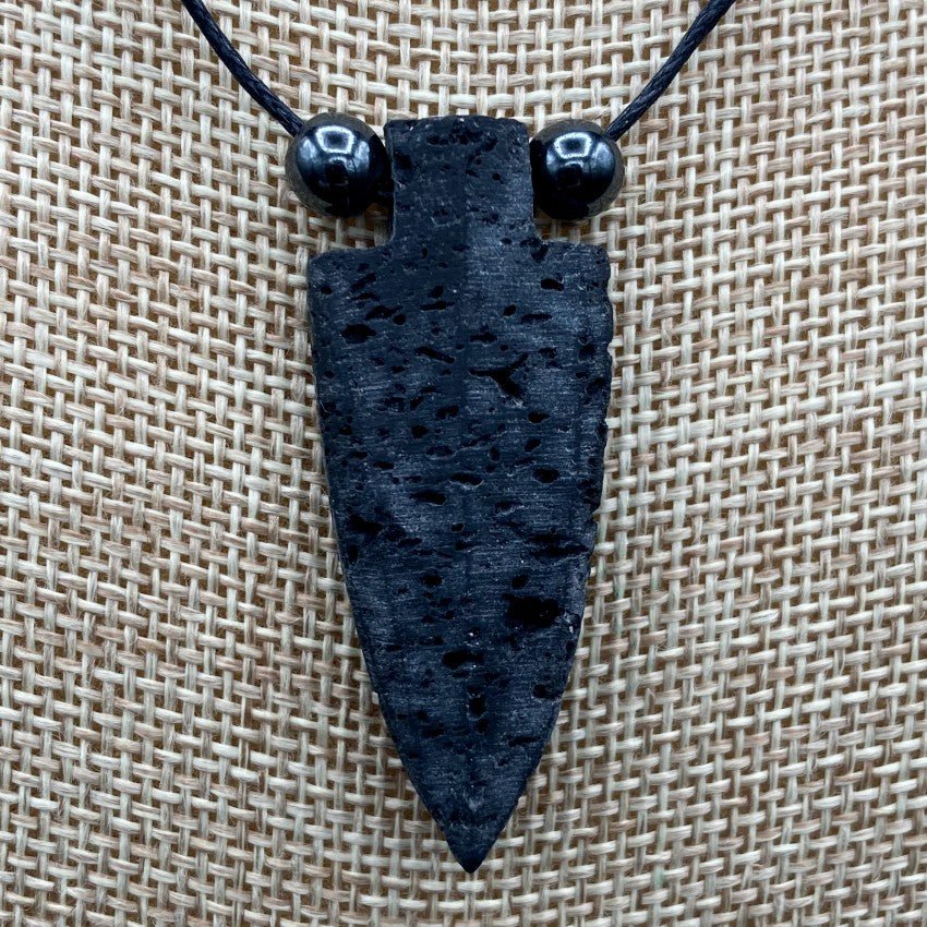 Up Close Of Lava Rock Arrowhead Pendant And Hematite Beads