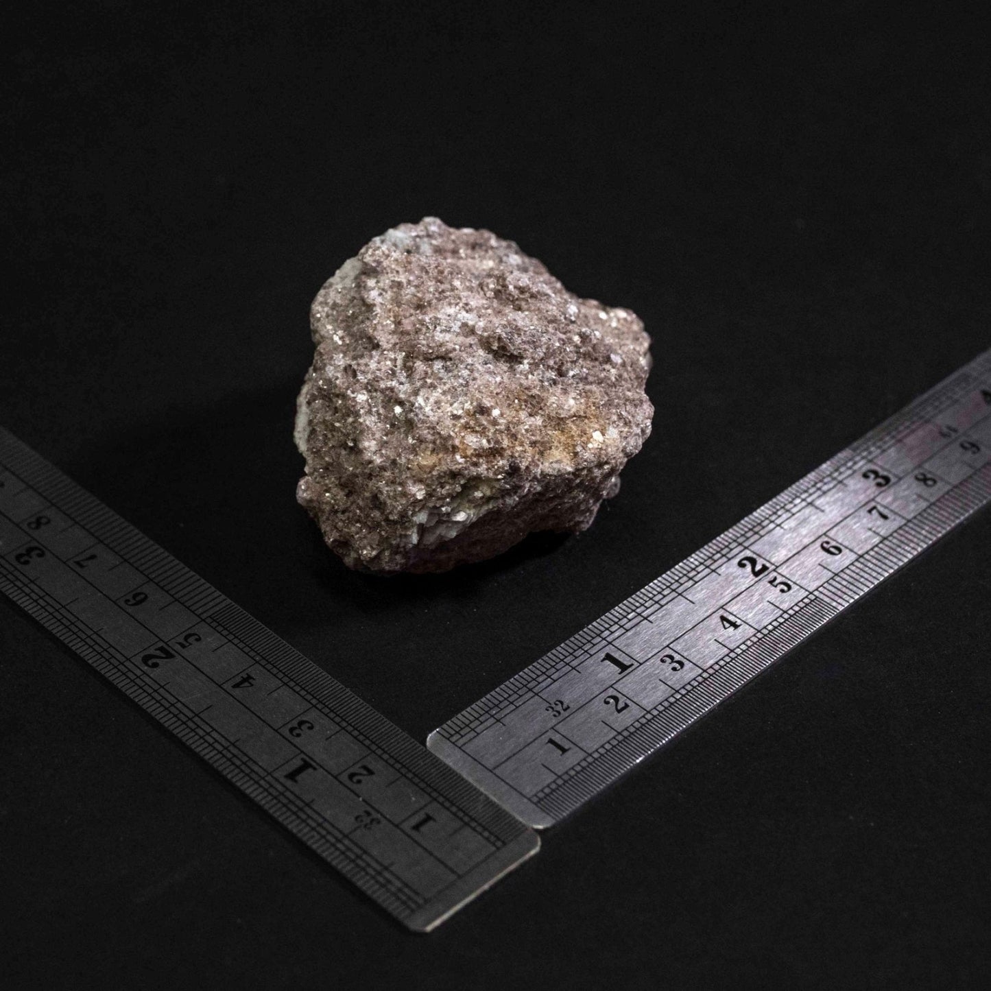 Lepiddiolite Rock With Ruler