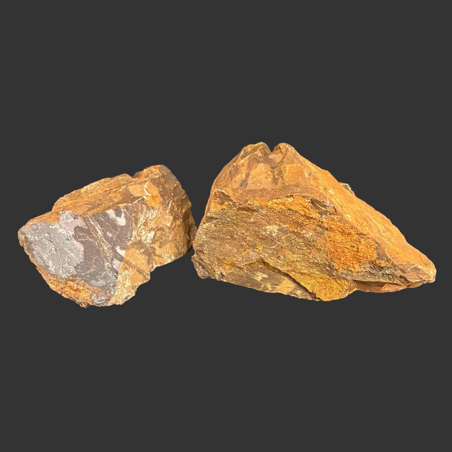 Two Raw Outback Jasper Stones on black background
