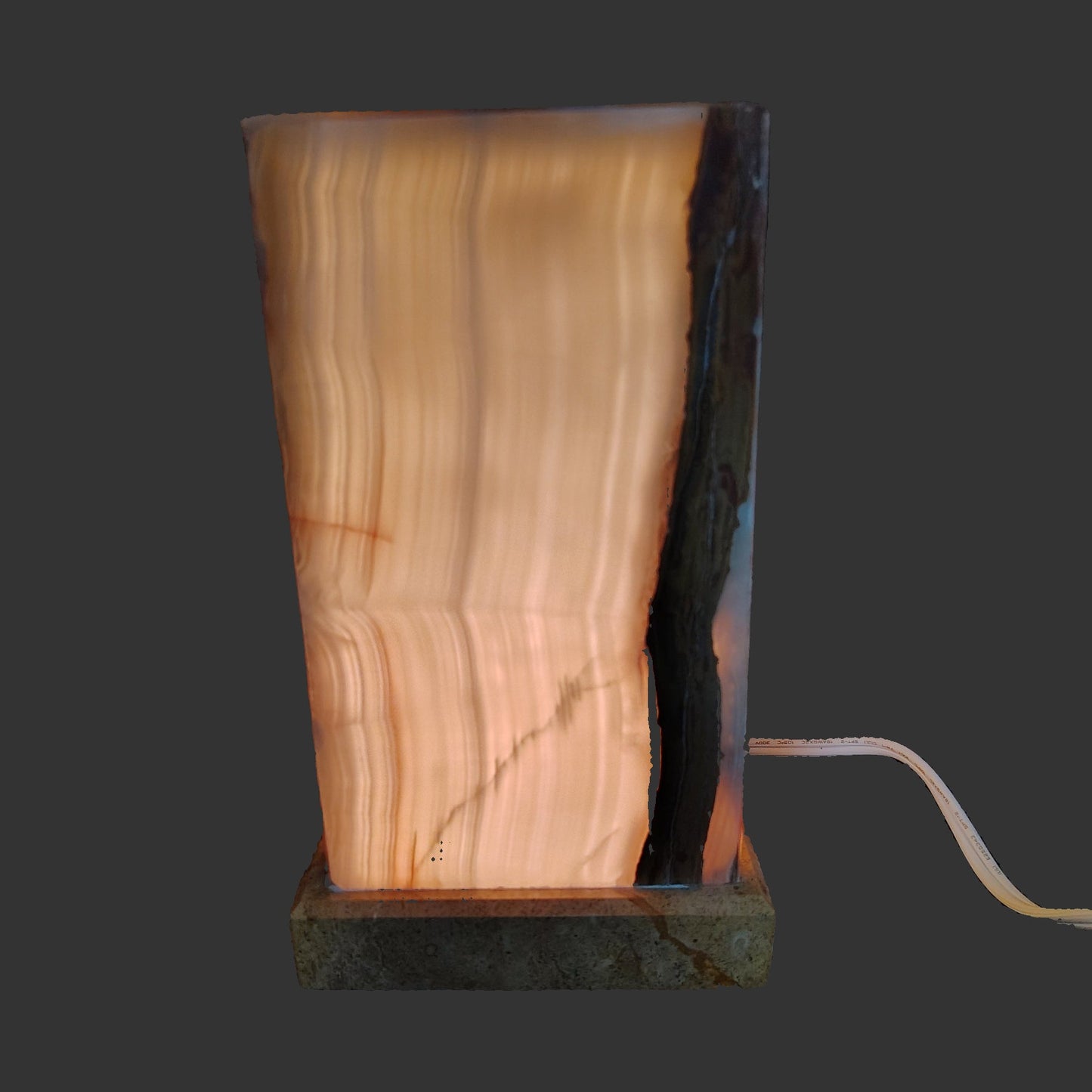 This is the rectangular onyx lamp with the light on.