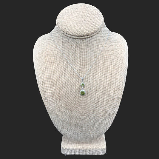 Sterling Silver With 2 Peridot Gemstones Necklace, The Chain Is A Box Chain And The Gemstones Are A Beautiful bright Green