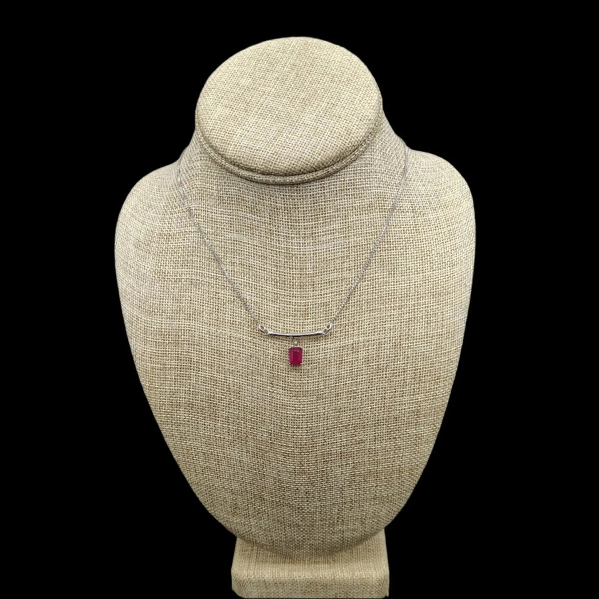 This is the front view of this Sterling Silver and red Ruby pendant necklace