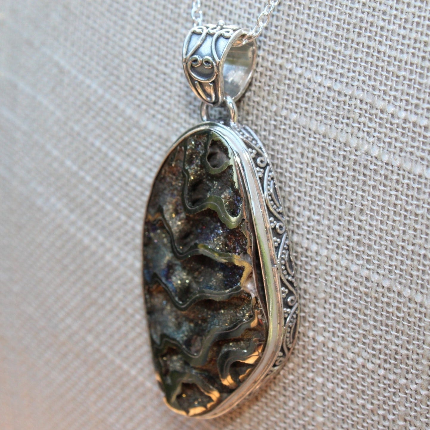 Side View Of The Bali Design On Ammonite Sterling Silver Pendant