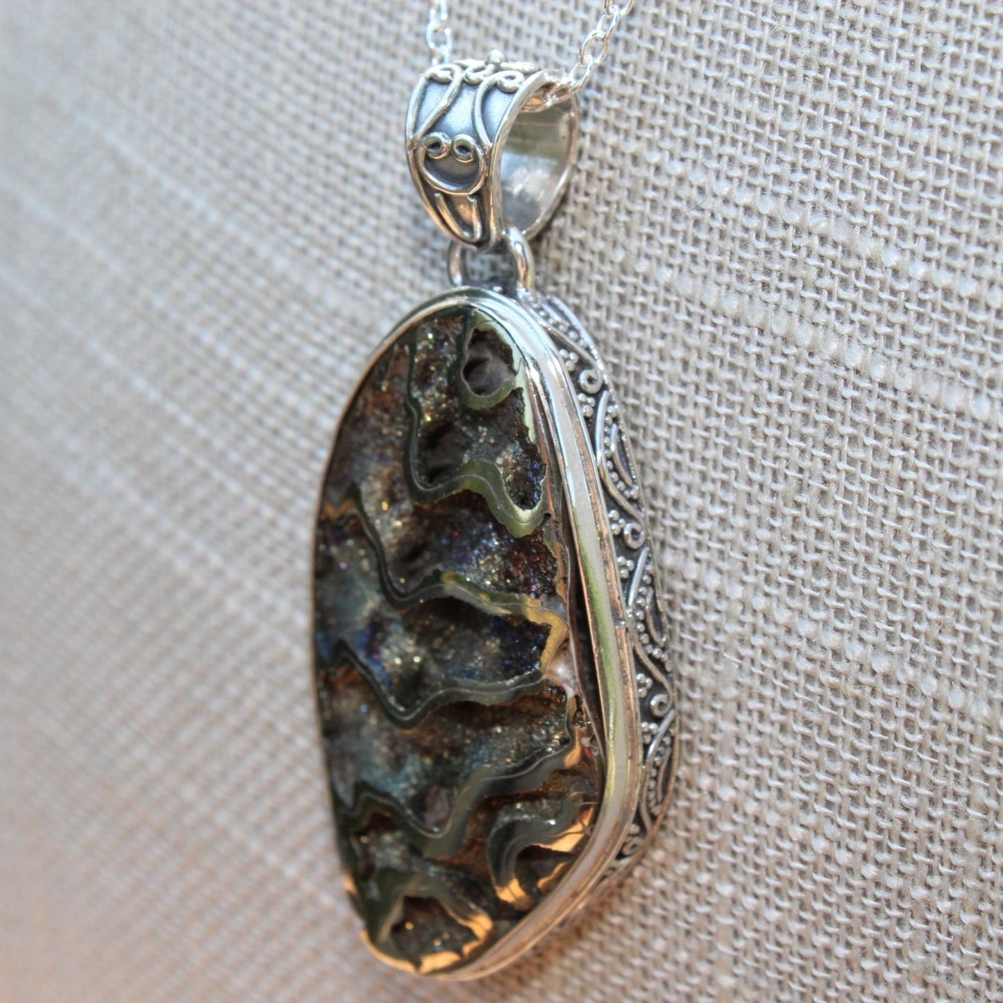 Side View Of Bezel On Ammonite Pendant