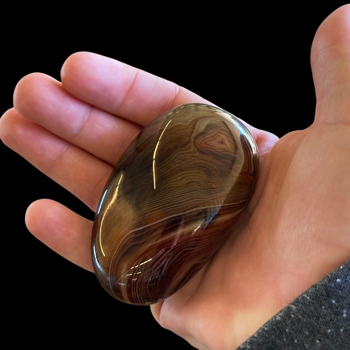 Sardonyx Palm Stone In Natural Light