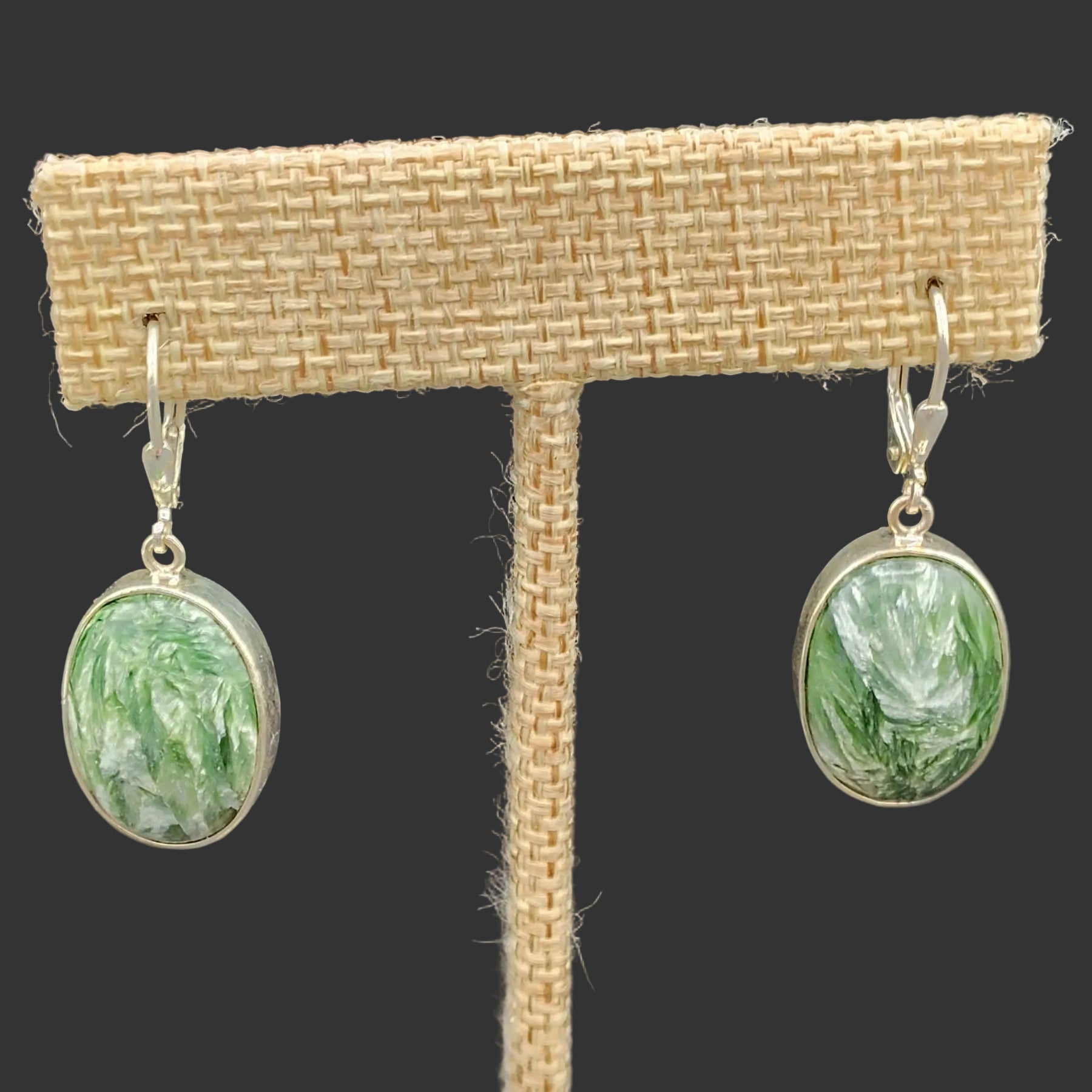 Close up of the green and white Seraphinite gemstones.