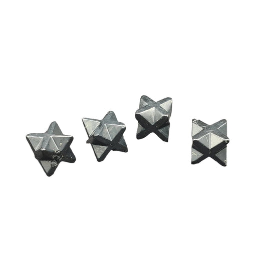 This picture is of a group of these Shungite Merkabas, polished and hand carved.