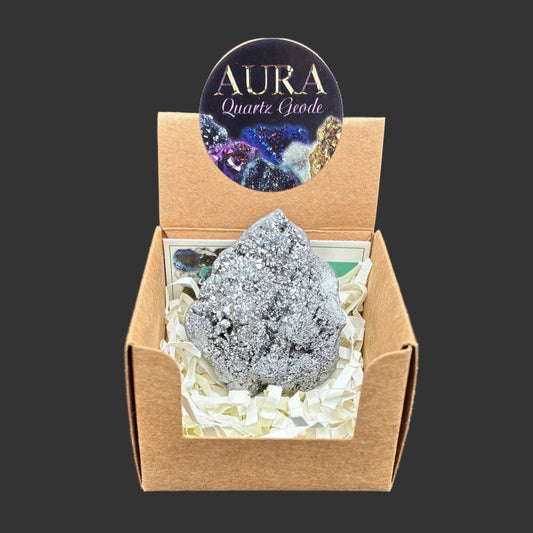 Silver aura quartz geode in the box that is provided with your purchase.