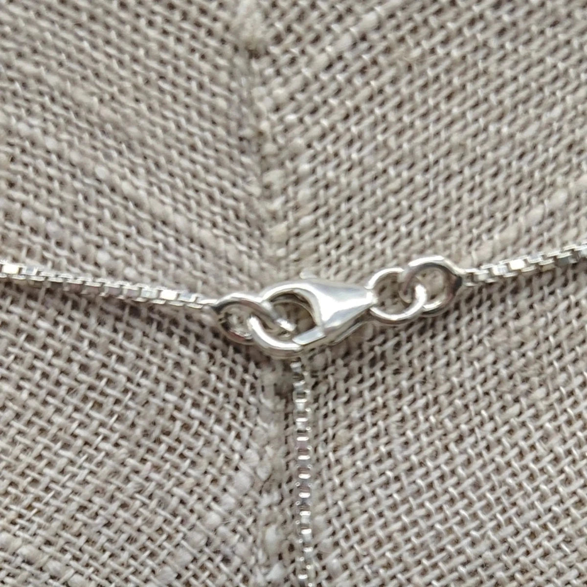 This is a close up of the Sterling Silver lobster claw clasp