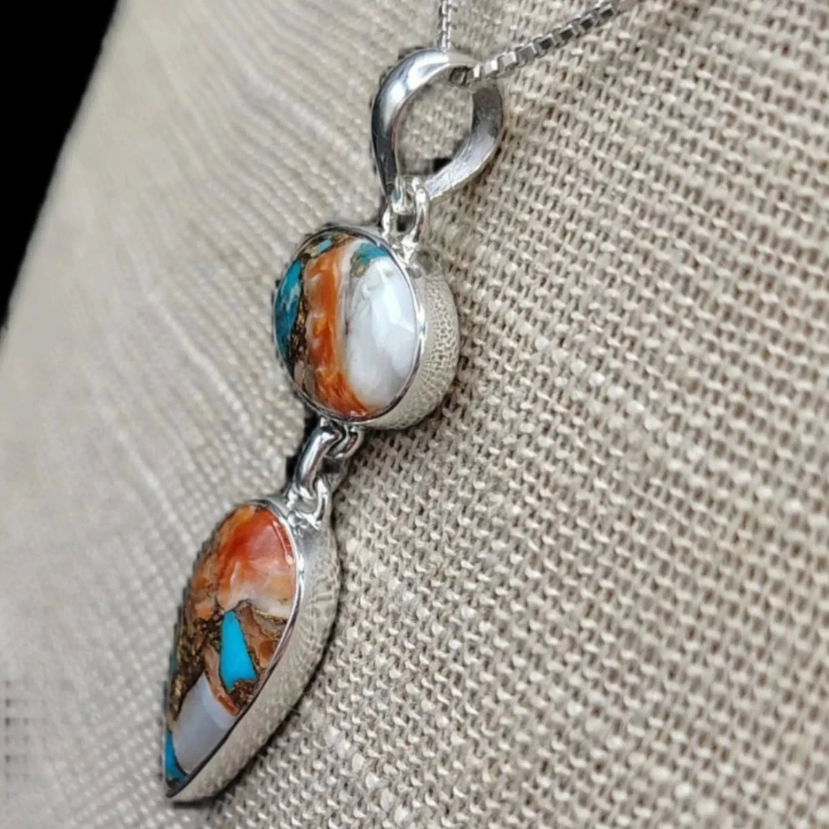 This is the side view of the Oyster Turquoise pendants