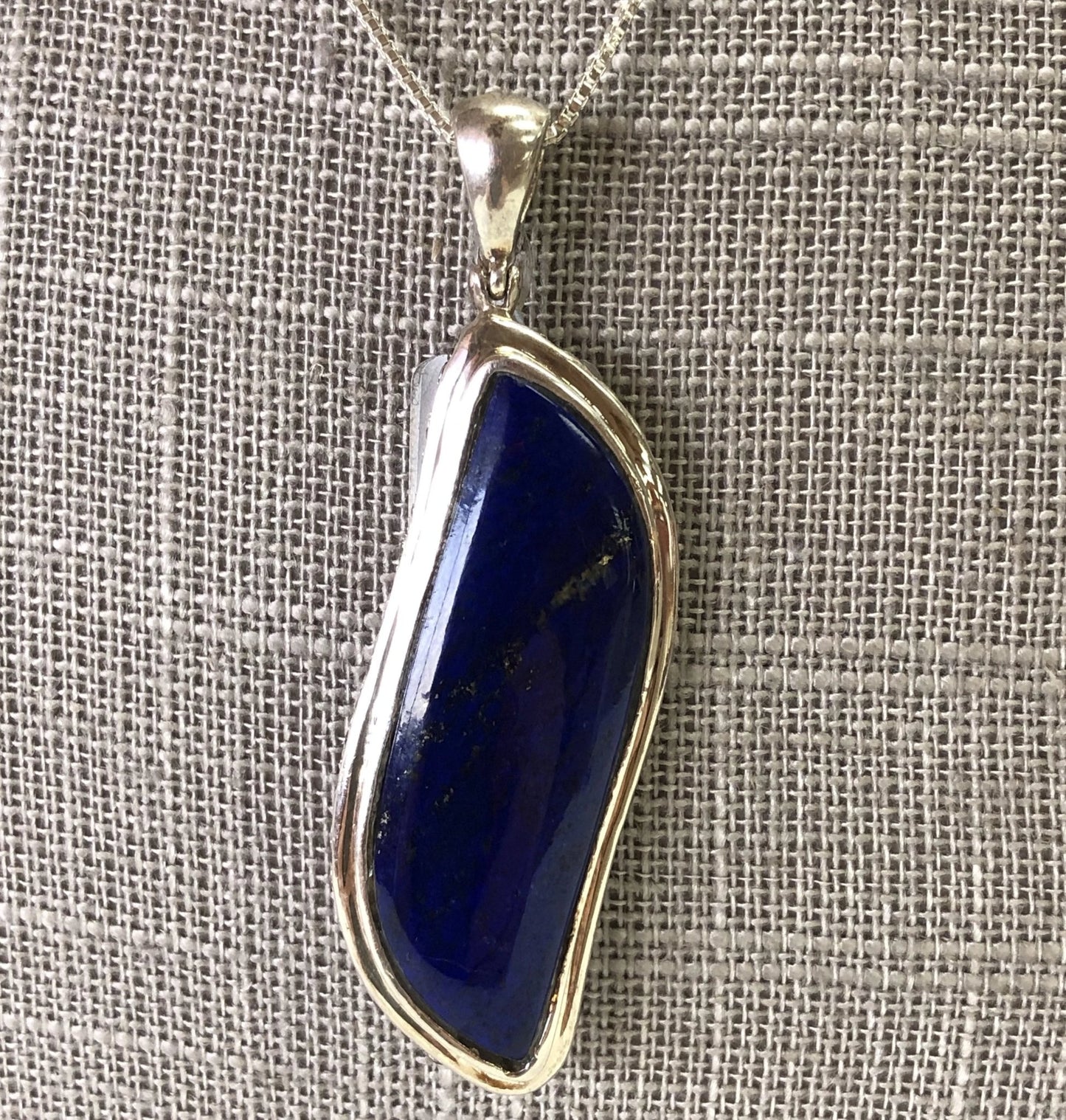 Close Up Of Elongated Lapis Pendant