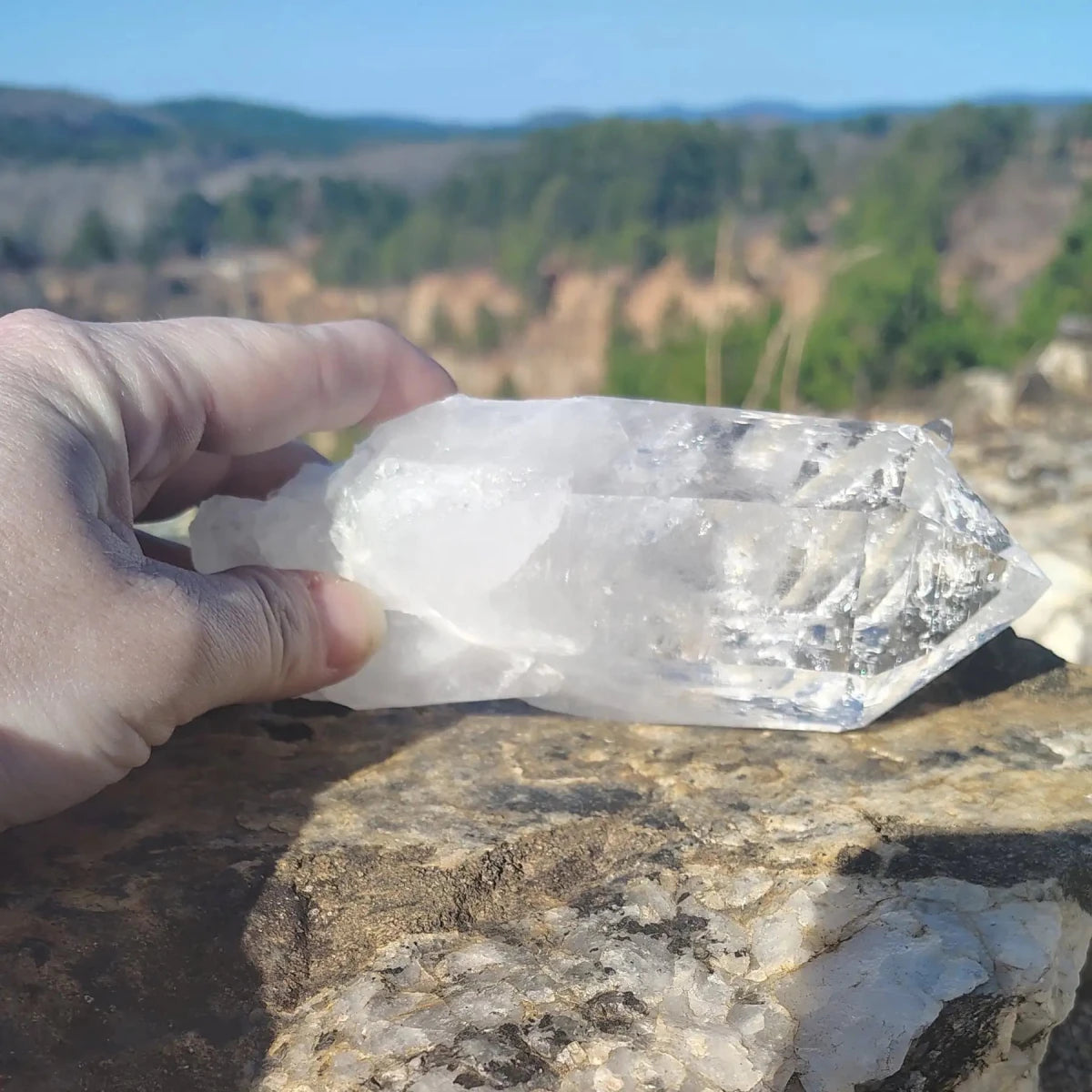 This is the back side of this single Quartz crystal point. It is half clear and half white.
