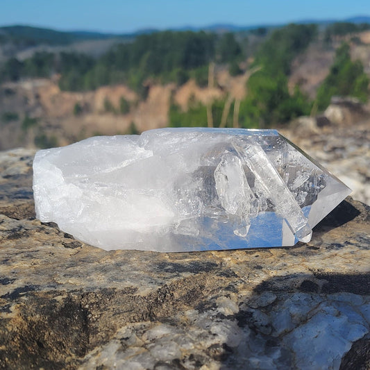 This is the front side of this quartz crystal point, and it has tabby crystals close to the point.