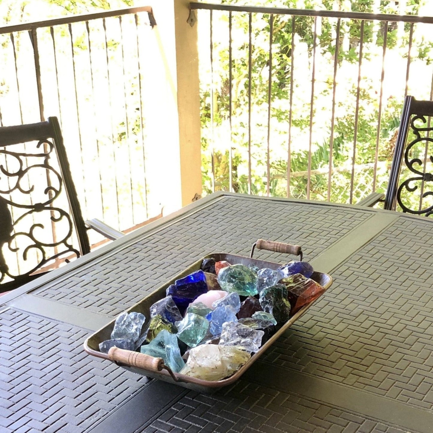 Bowl Of Slag Glass On Patio Table cobalt blue, white, caribbean blue, green, pink, white colors