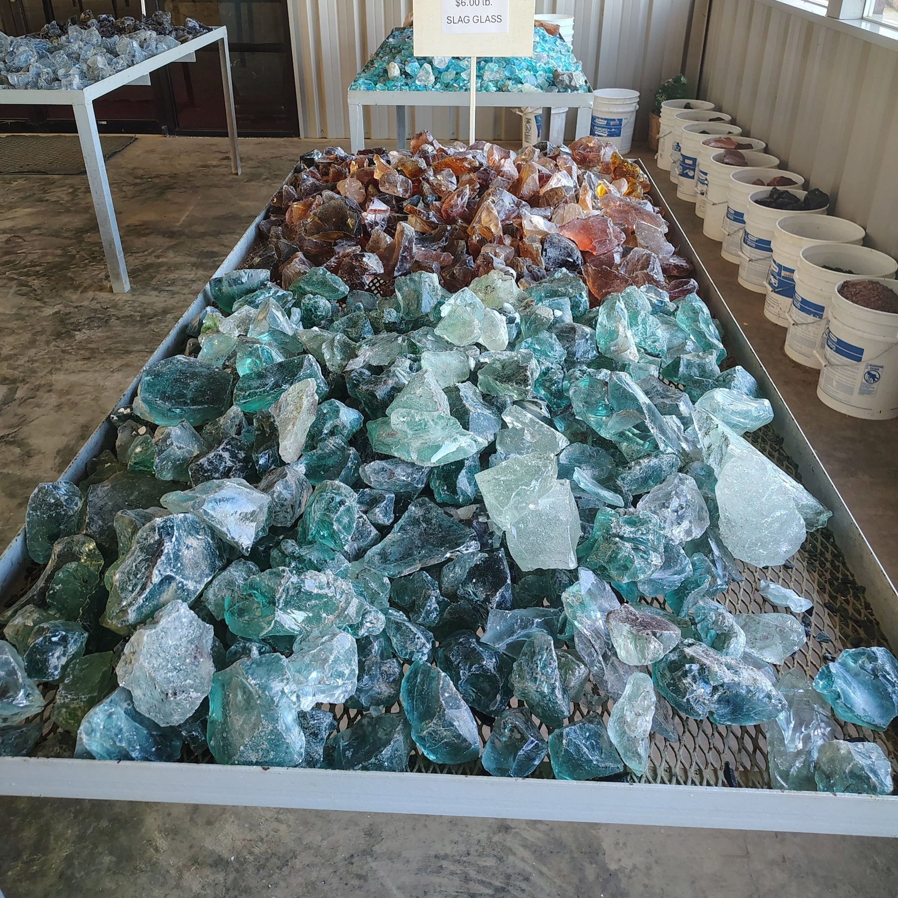 This is a picture of green and amber slag glass cullets