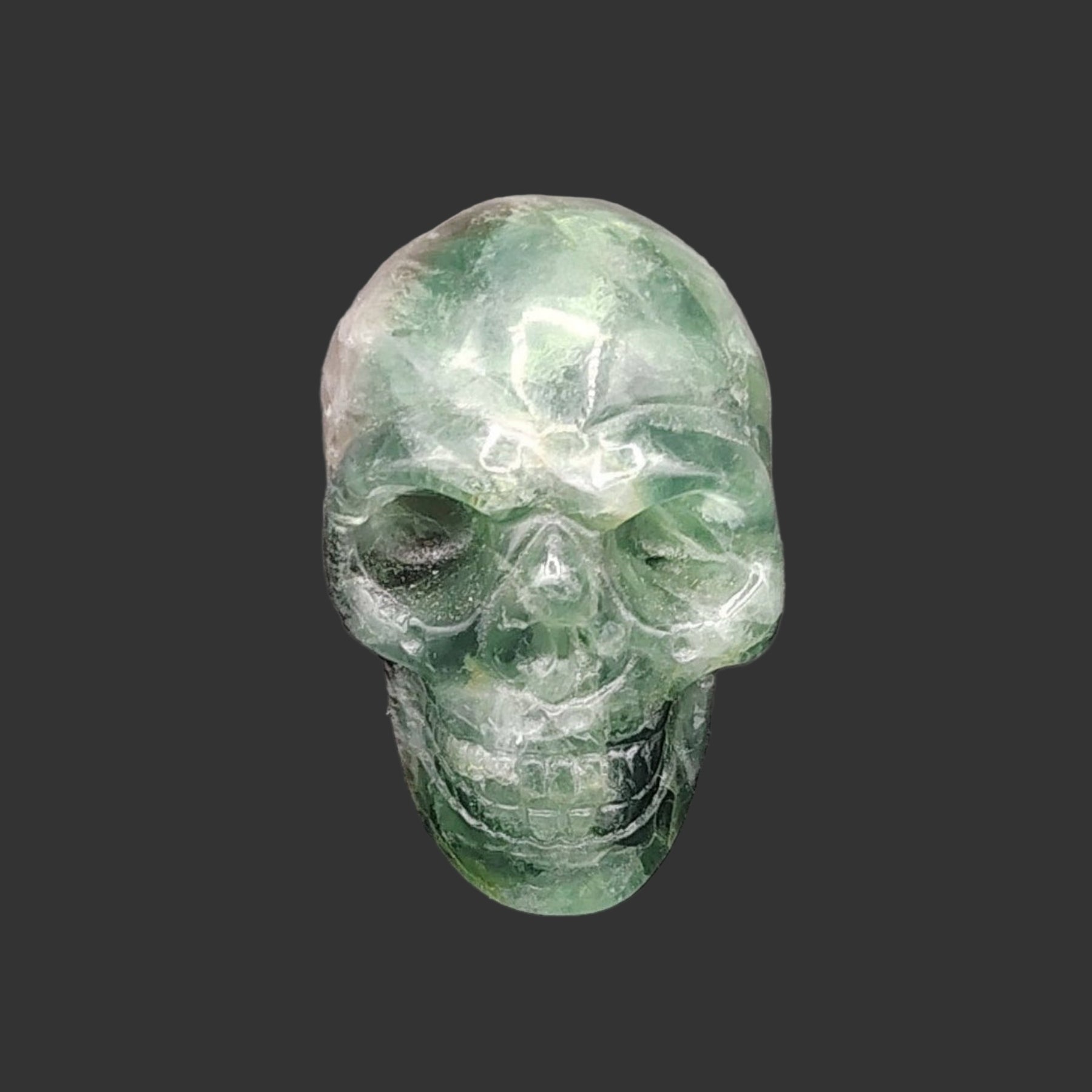 This is the front side of this polished fluorite skull.