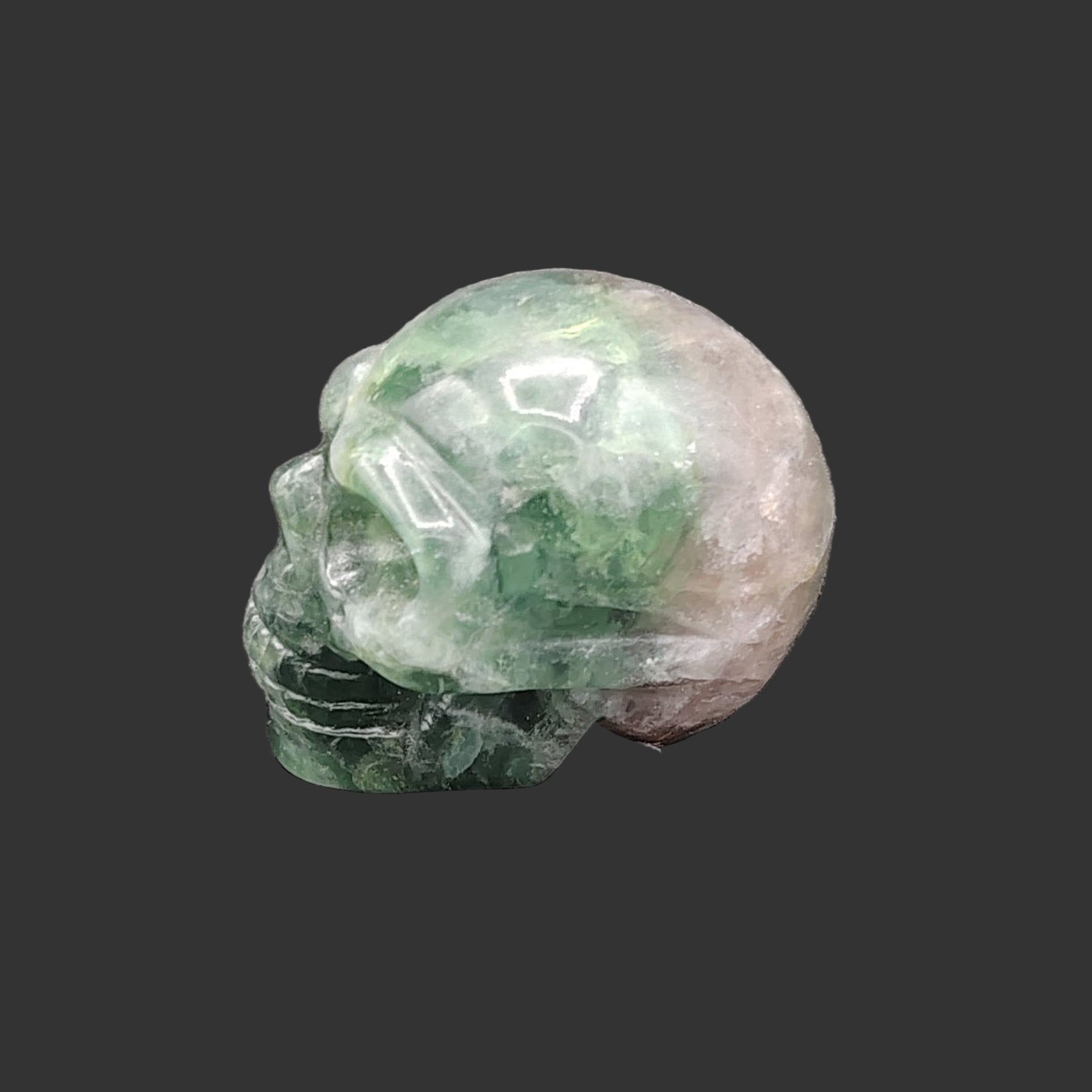 This is the left side of this polished fluorite skull.