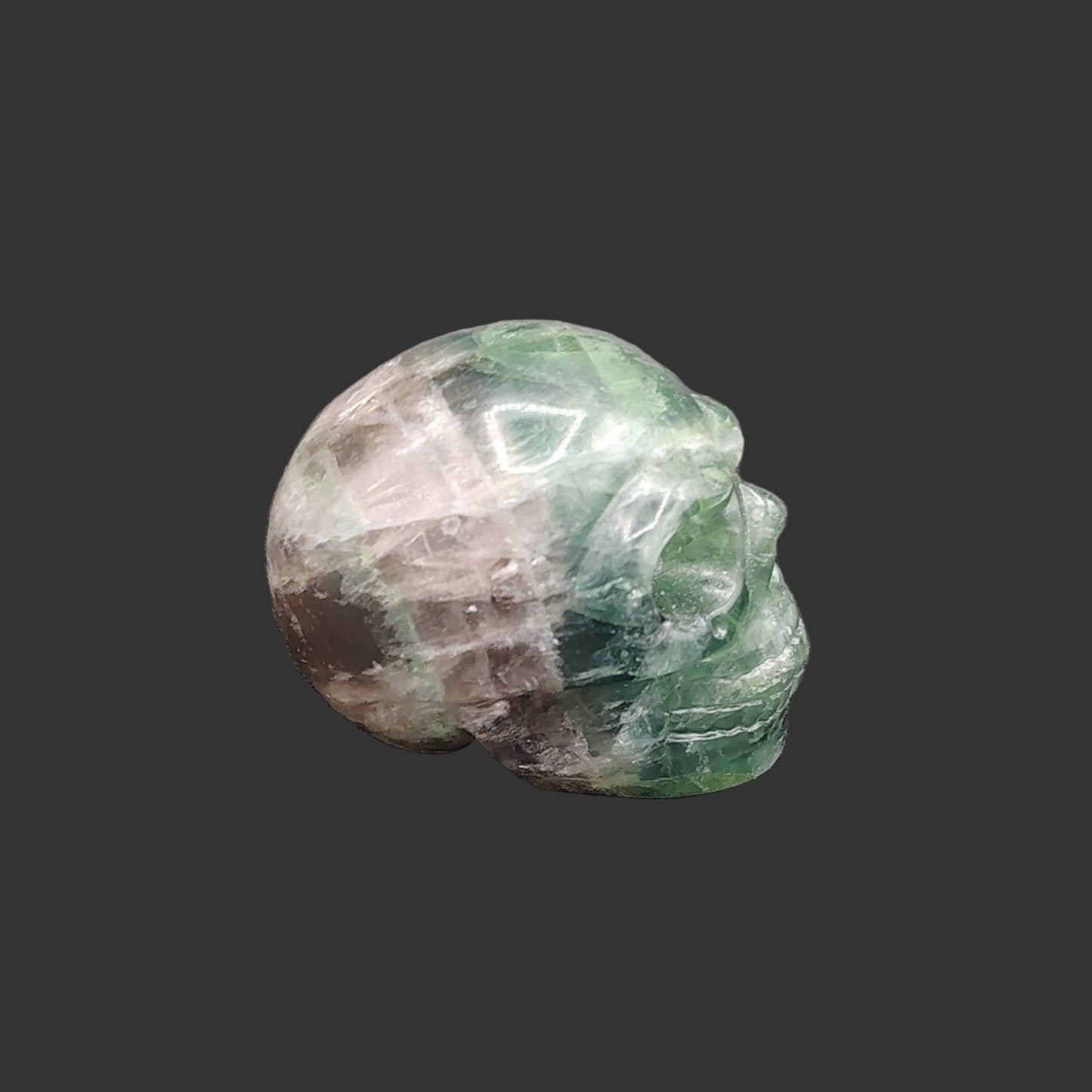 This is the right side of this polished fluorite skull.