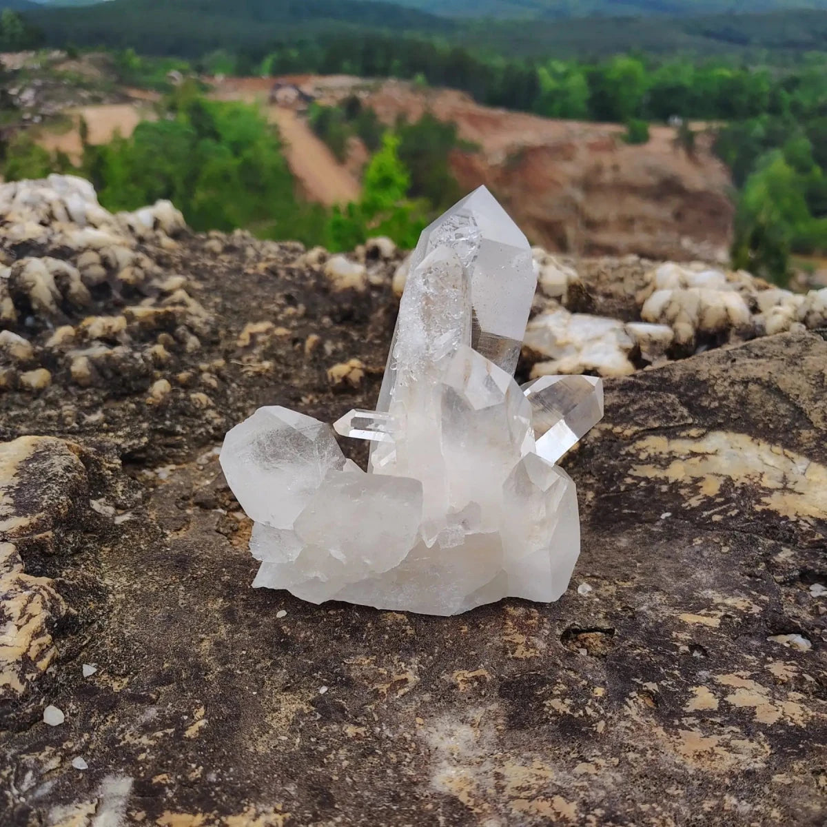 This is the front side of this small energy Quartz crystal cluster