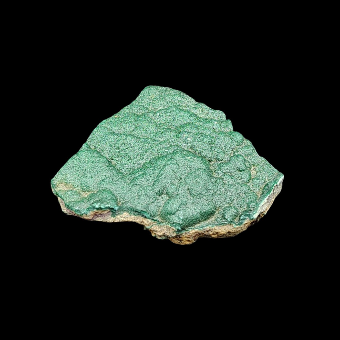 This is the back side of this piece of Malachite