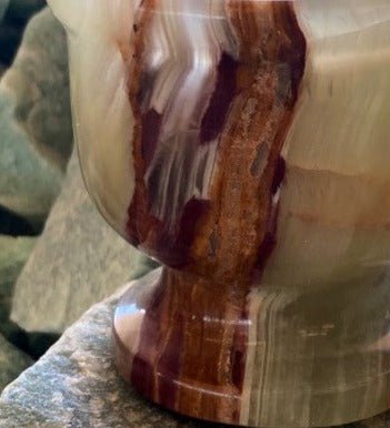 Close up of banding on green onyx Mortar and pestle