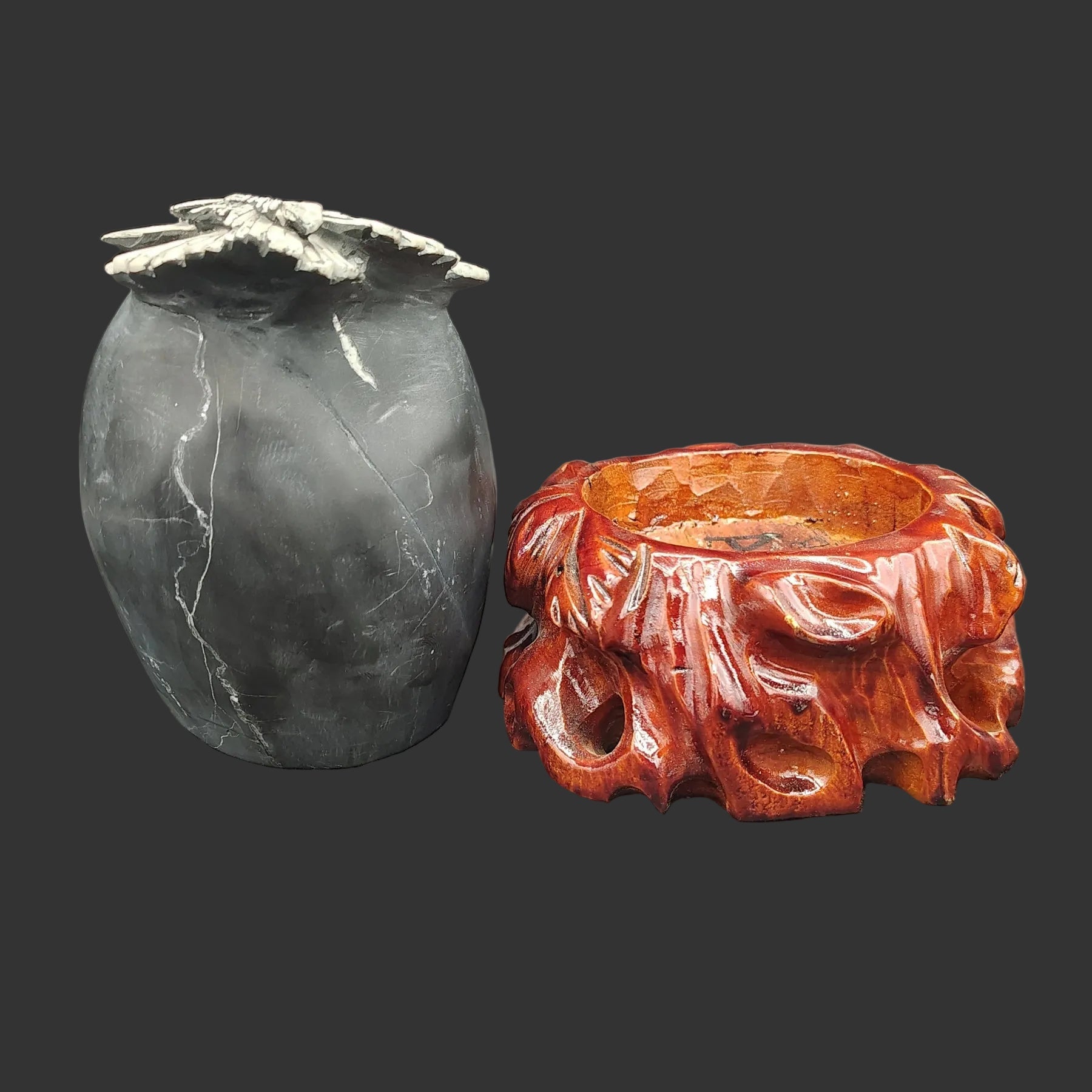 The Chrysanthemum stone is removable from the wooden base.