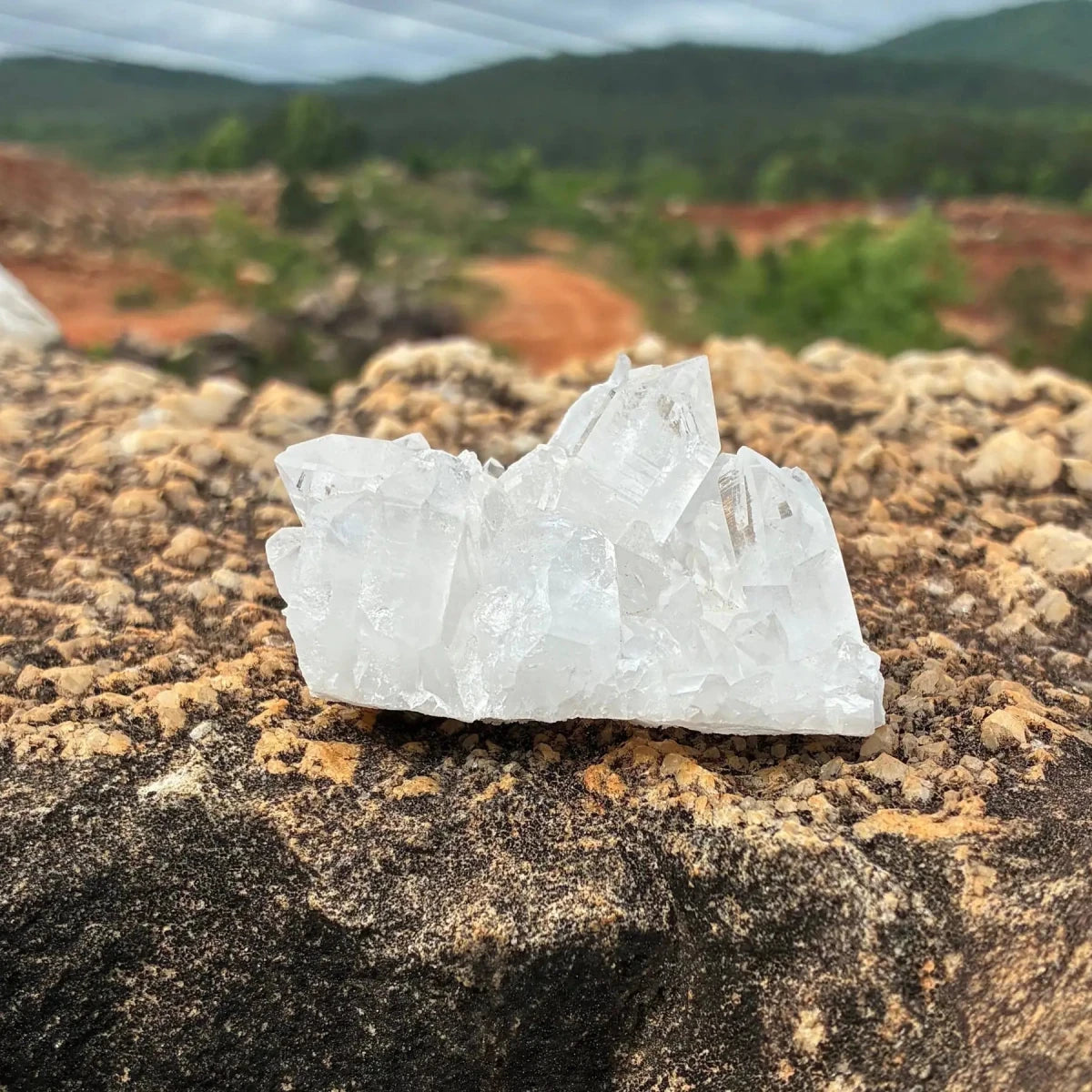 This is the front side of this quartz cluster in the outdoors.