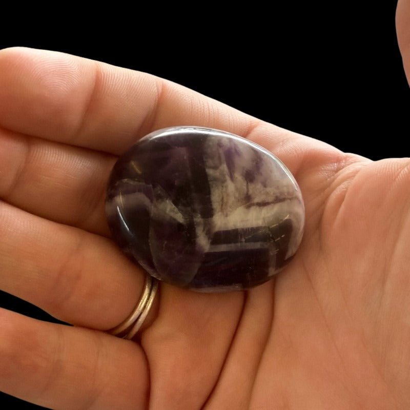 Small Polished Purple And White Zig-Zagged Pattern Chevron Amethyst Palm Stone In Natural Light