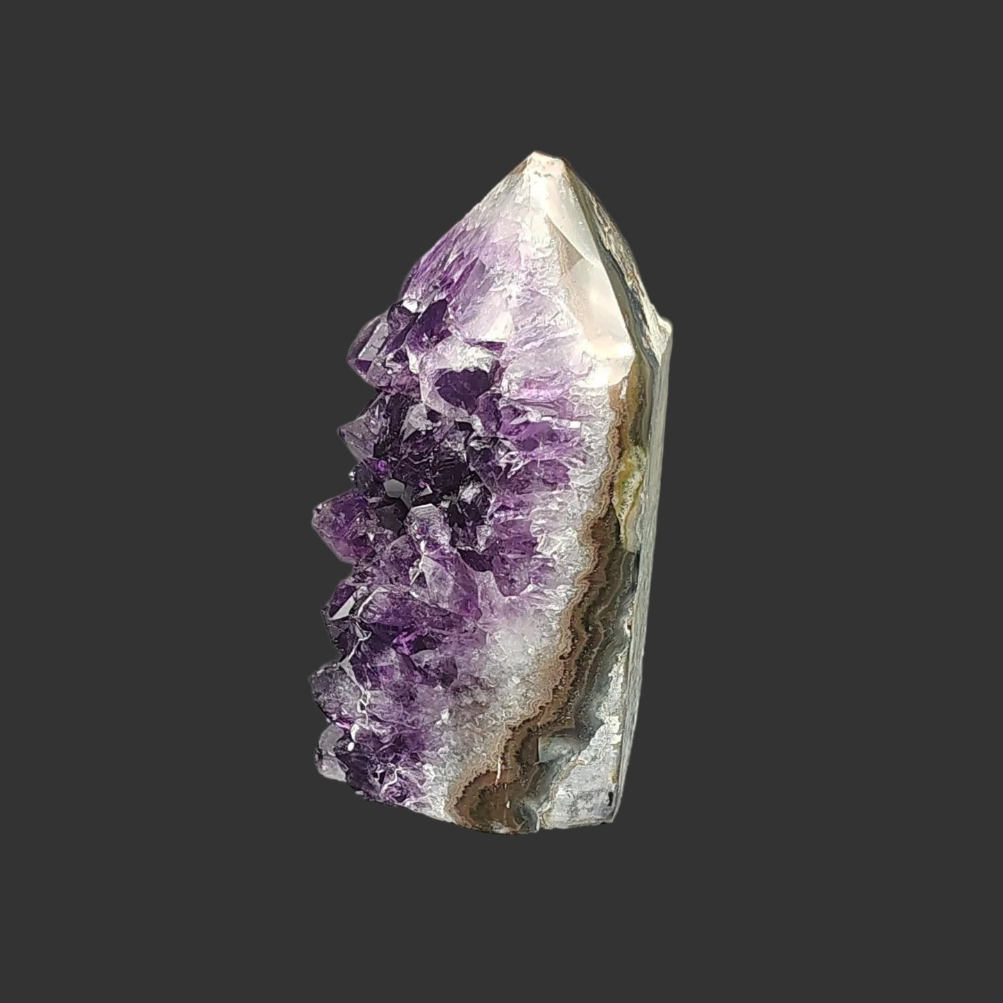 The left side of this small tower has Agate and Quartz, polished to perfection.