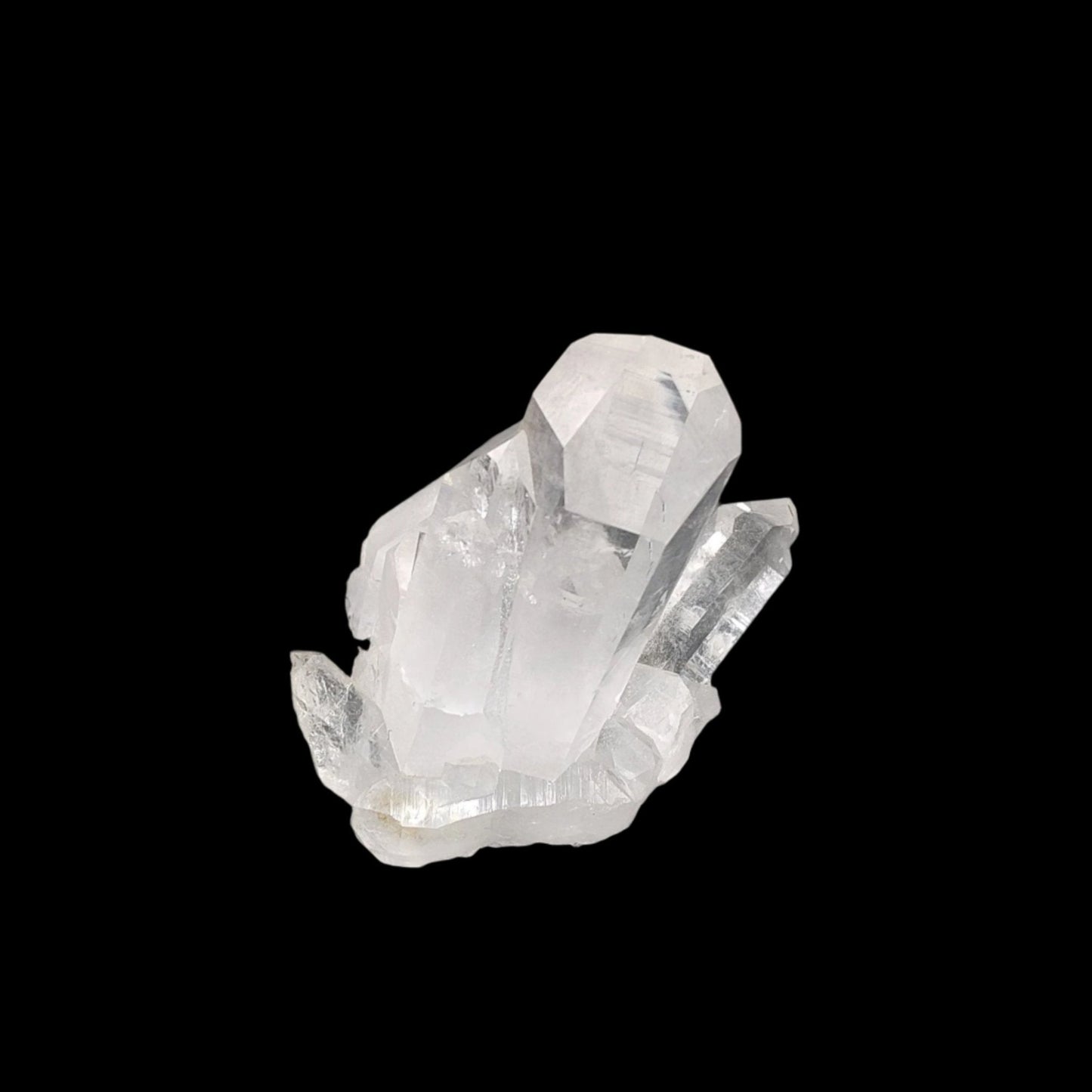 This is the right side of this water clear Quartz crystal cluster