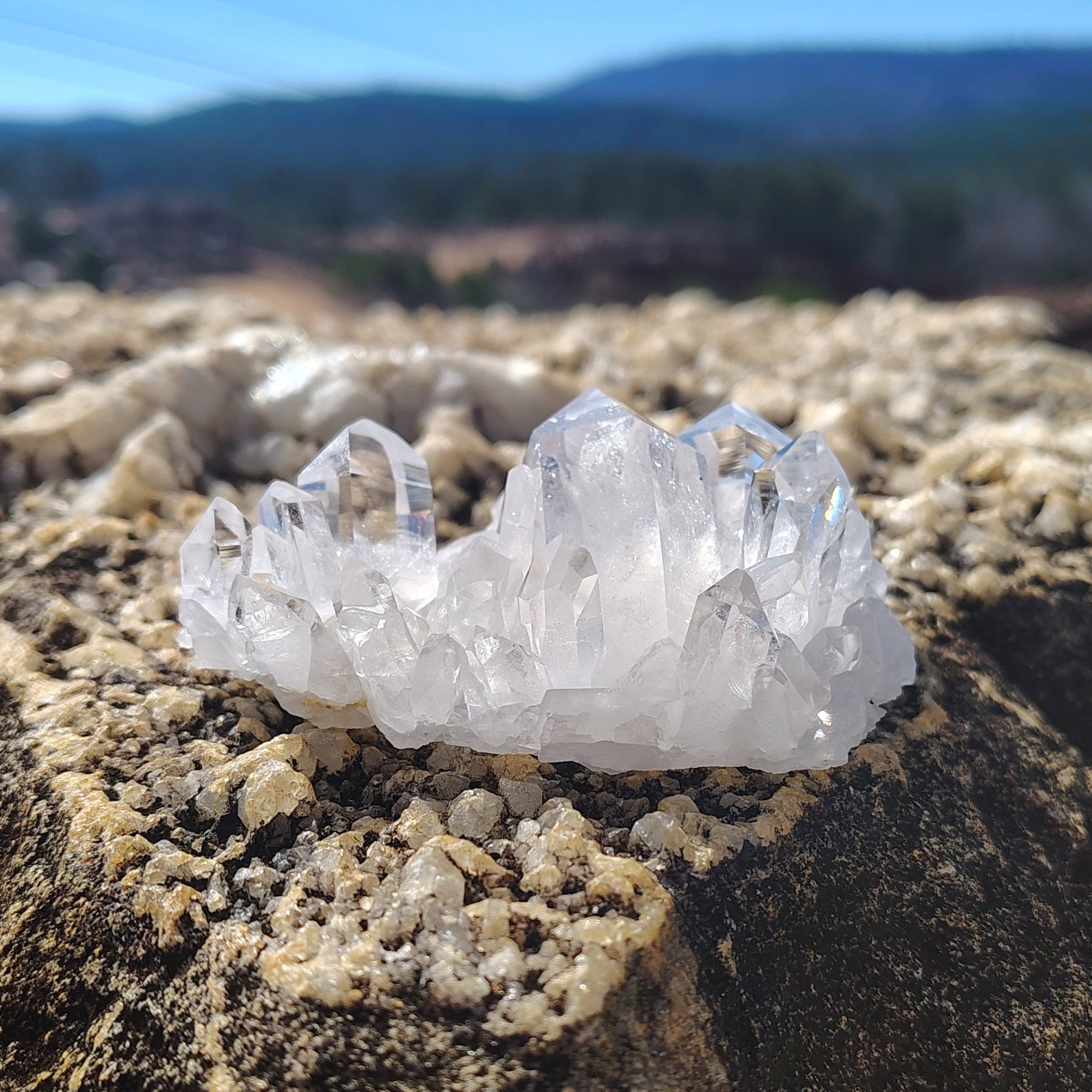 This is the back side of this small water clear Quartz cluster.
