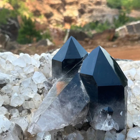 Smoky Quartz Heat Enhanced Quartz Cluster Sitting On A Boulder