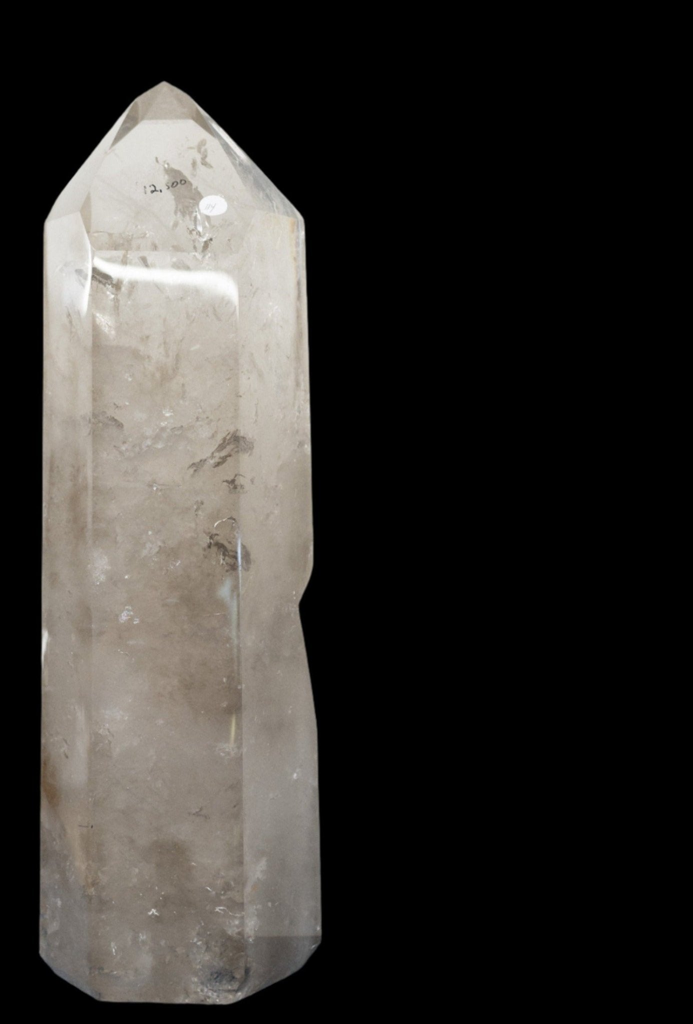 Side View White Stone On Black Background Smoky Quartz Point