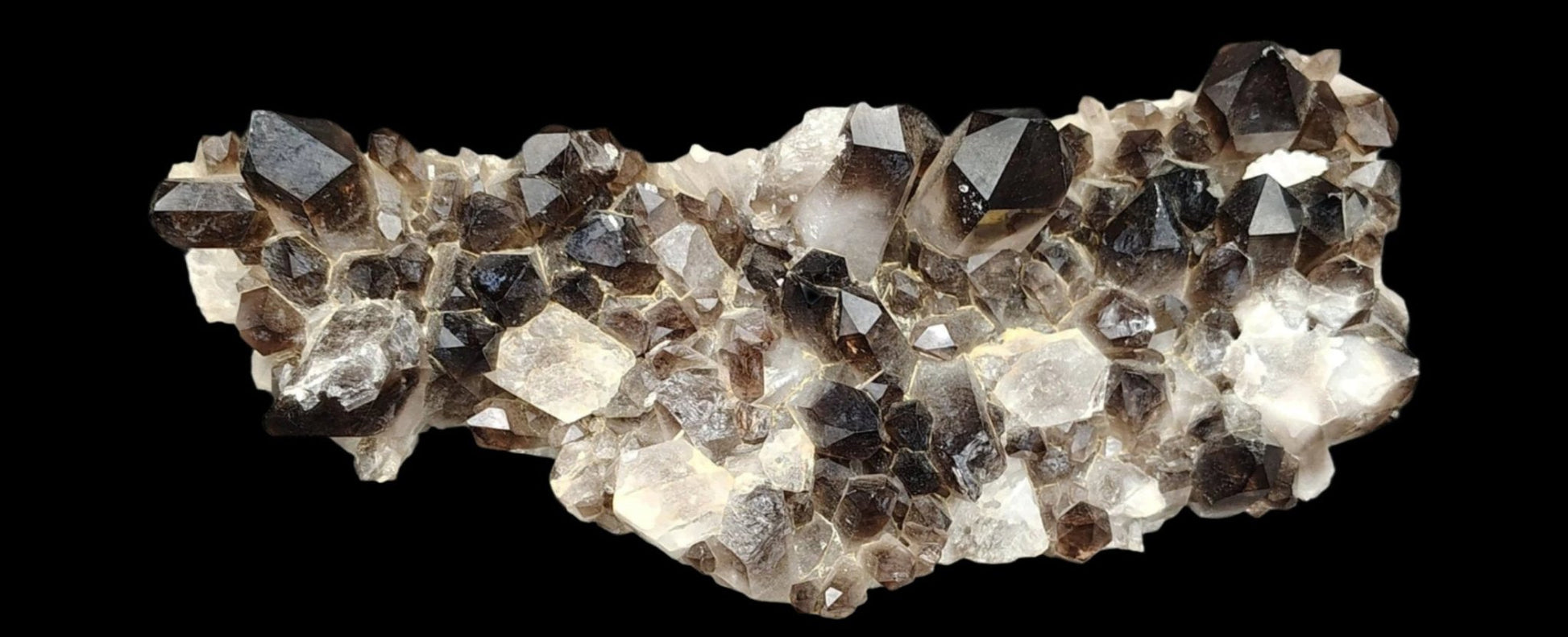 this is a close up of the smoky Quartz crystal points in this cluster