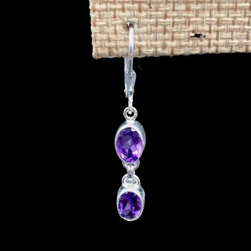Close Up Of Sterling Silver Amethyst Gemstone Dangle Earrings, Each Earring Has 2 Gemstones