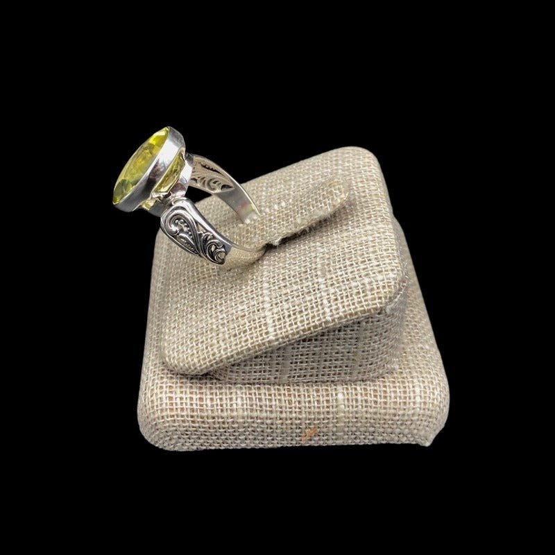 Side View Of Sterling Silver And Lemon Quartz Ring, Paisley Design On Each Side Of The Gemstone On Band 