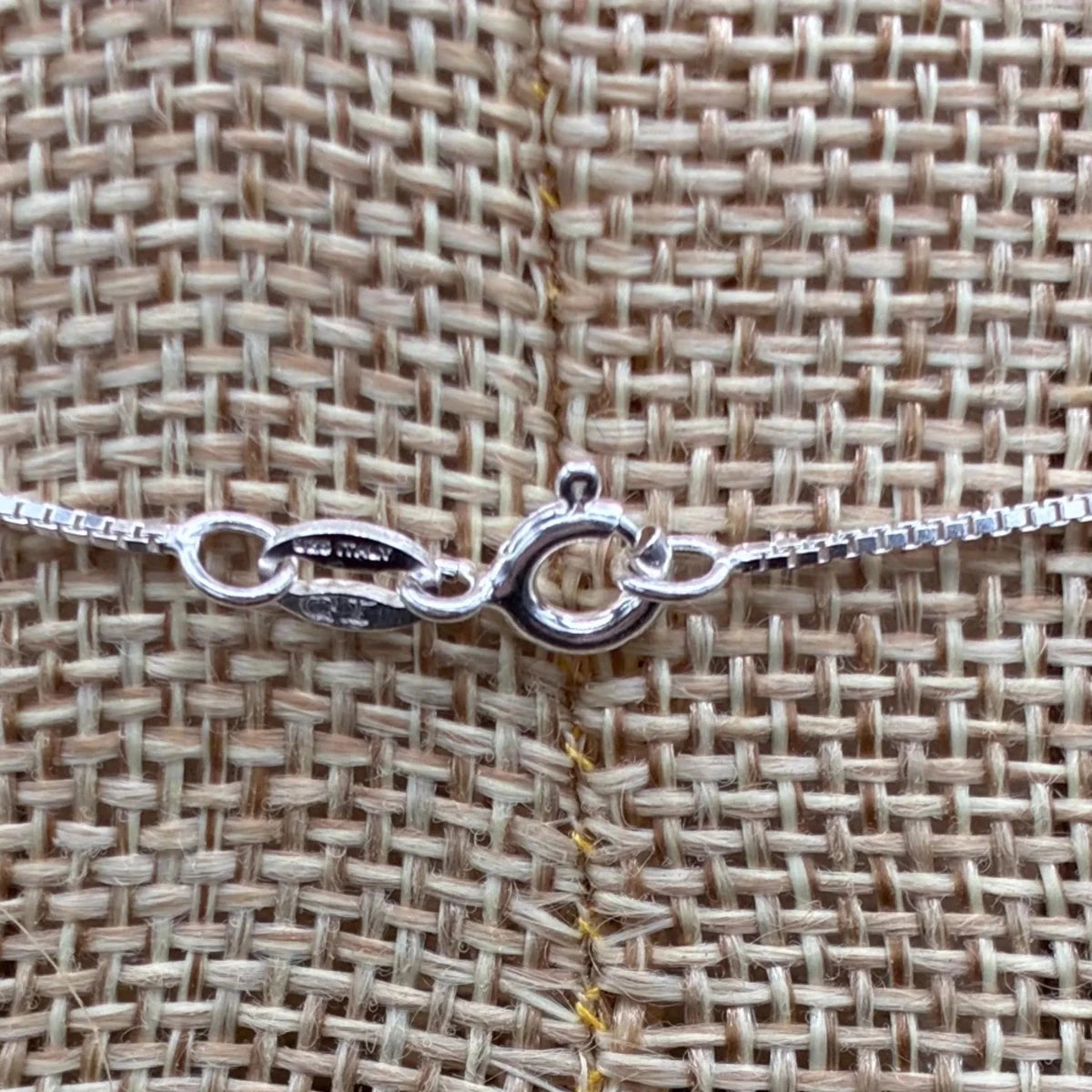 This necklace has a spring ring clasp on it.
