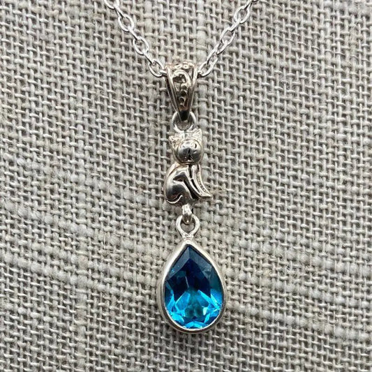 Close Up Blue Topaz Cat Pendant In Sterling