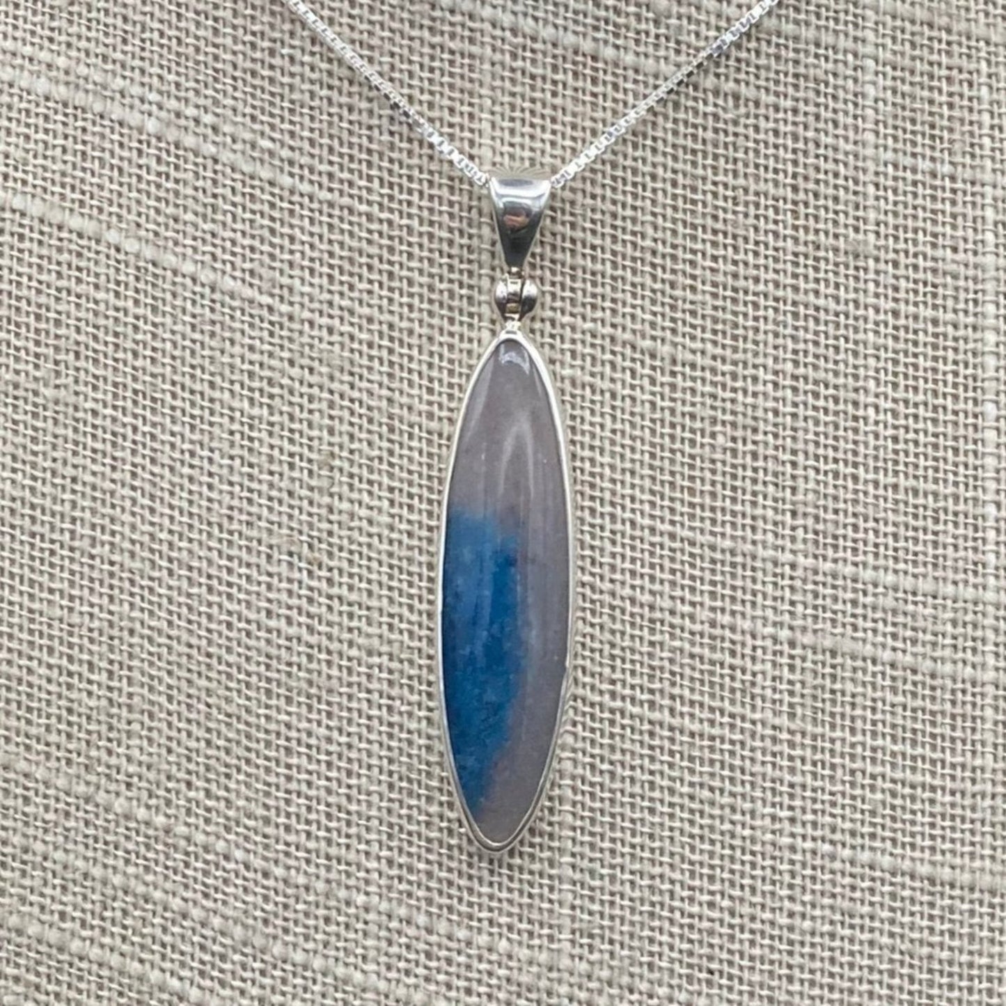 Close up of Blue Dumotierite Quartz Pendant